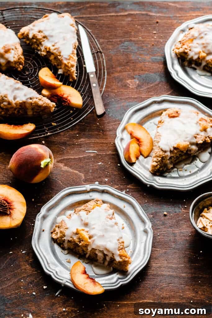 Unlocking the Flavor of Caramelized White Chocolate 8 Two beautifully plated peach and caramelized white chocolate scones, topped with a delicate glaze, highlighting the ingredient's versatility in baking.