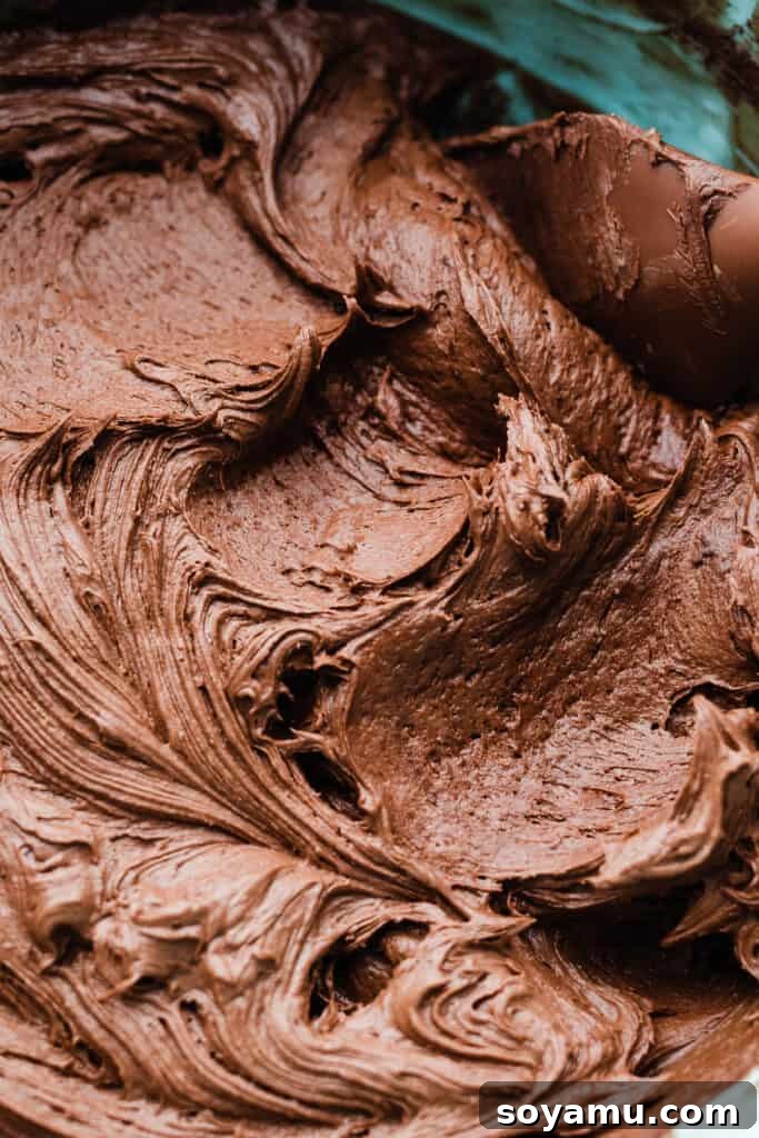 A close-up of the chocolate frosting.