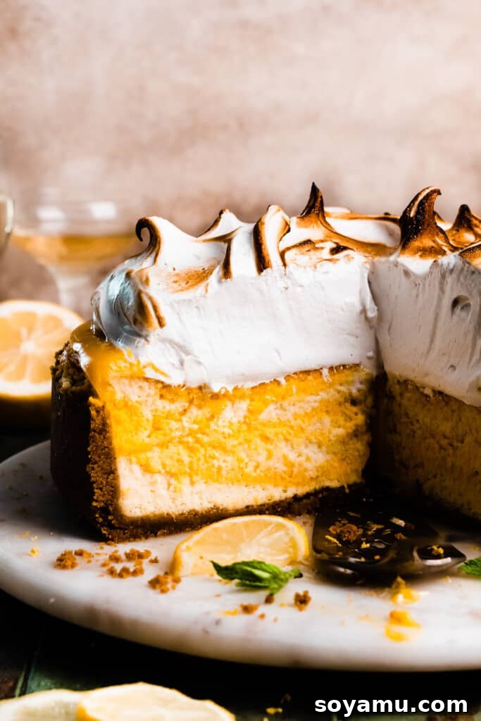 Crafting Silky Smooth Swiss Meringue 11 A decadent lemon meringue cheesecake topped with perfectly toasted Swiss meringue, showcasing its beautiful texture.