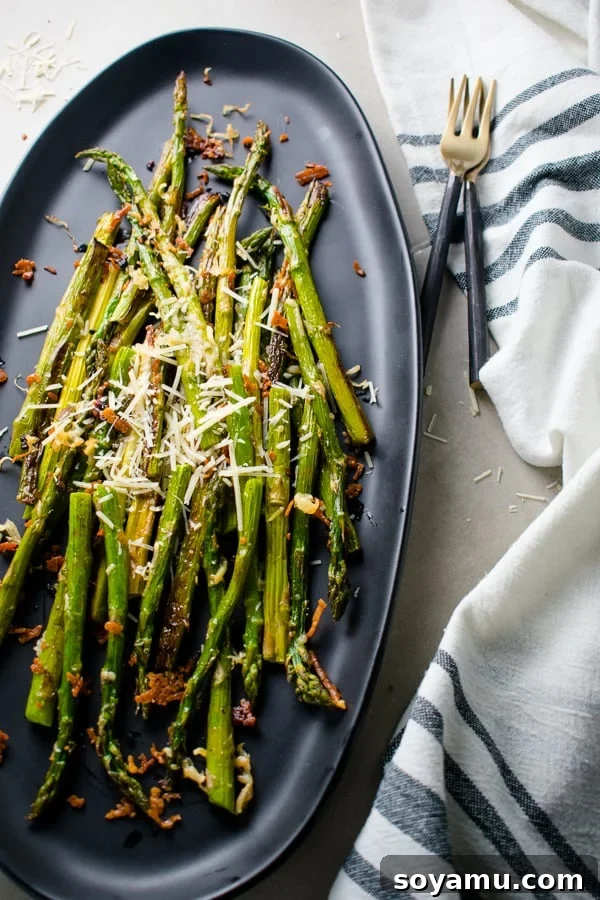 Golden Roasted Parmesan Asparagus 2 Parmesan Roasted Asparagus, golden brown and crispy, perfect for a healthy side dish