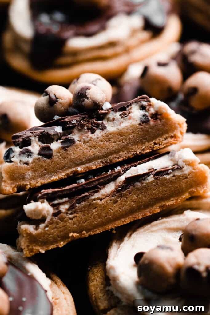A close-up of a stack of two cookie halves, showcasing the perfectly chewy and soft interior texture.