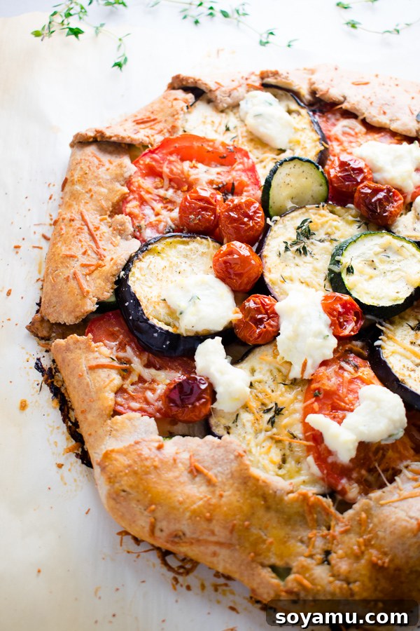 A beautifully baked Mixed Vegetable Galette, ready to be served, showing its golden edges.