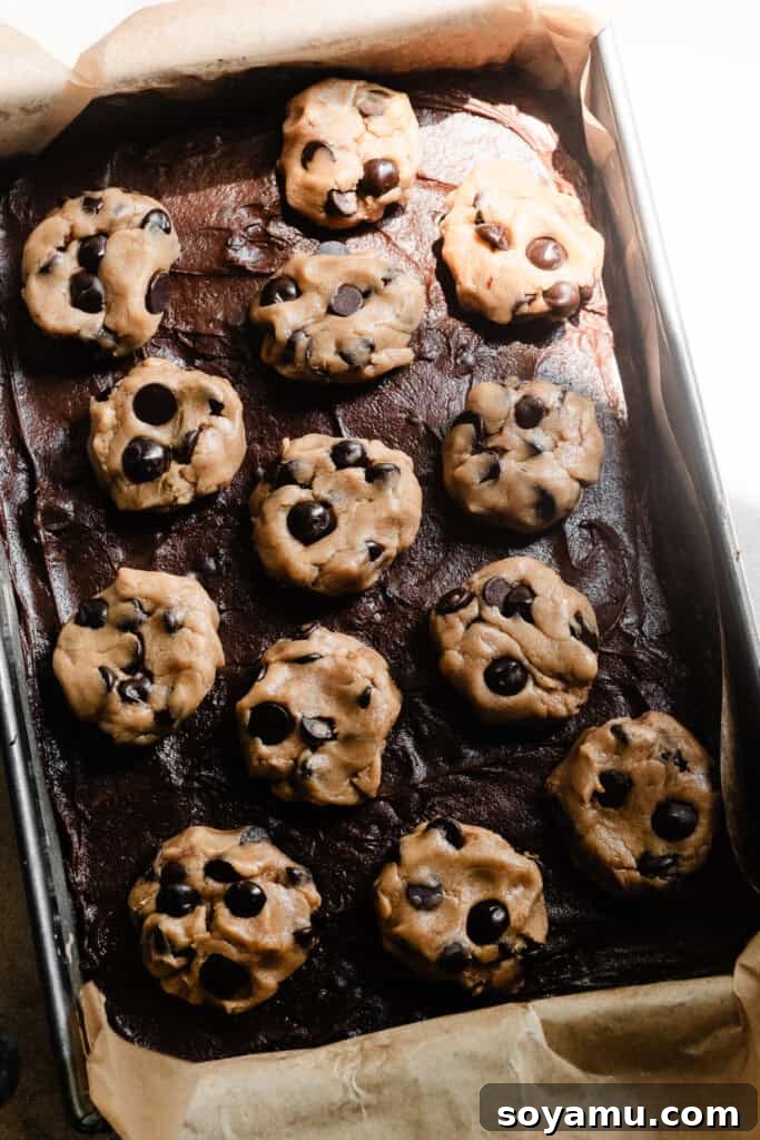 Nutty Brown Butter Brookies 6 An assembled pan of brookies, with layers of brownie and cookie dough waiting to be baked to perfection.
