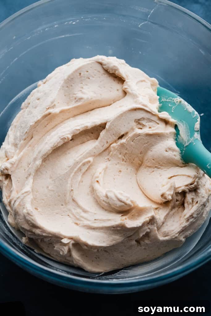 Tiramisu Cloud-Topped Cookies 7 A bowl of freshly prepared whipped mascarpone frosting, light and creamy, ready for decorating.