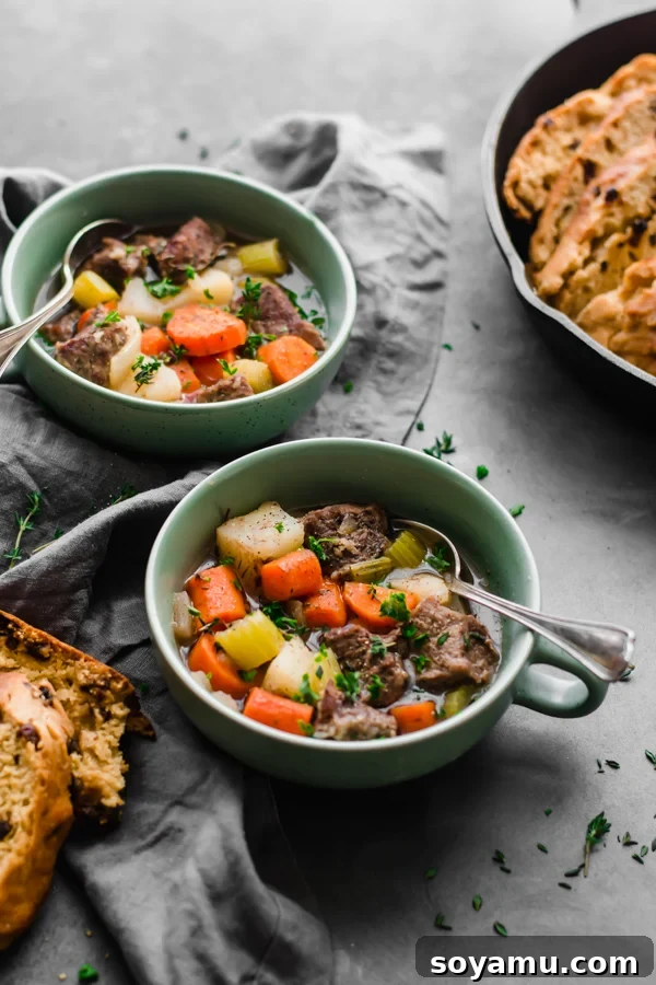 Serving bowls filled with hearty Irish stew.