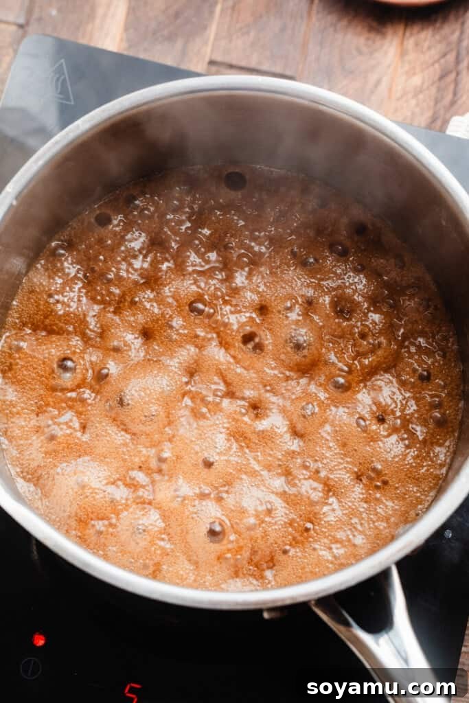 Whip Up 10-Minute Golden Butterscotch 6 The mixture boiling in a saucepan.