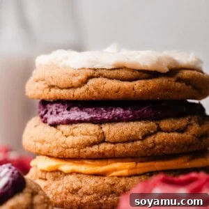 A stack of frosted brown butter sugar cookies.