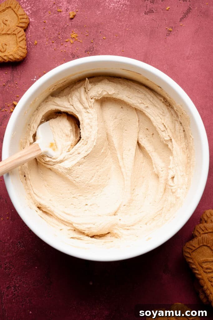 Biscoff Overload Cupcakes 12 A bowl of creamy cookie butter frosting.