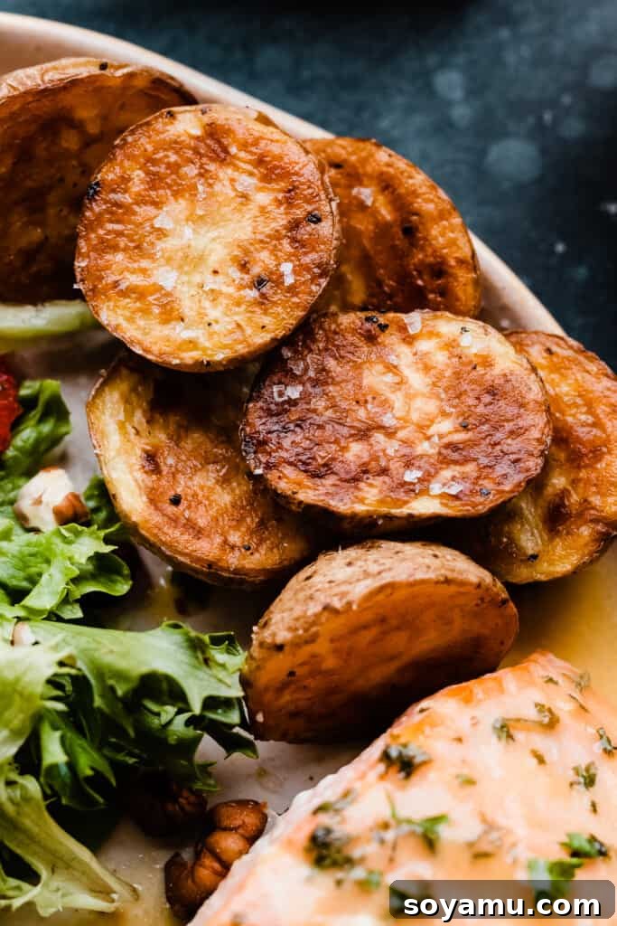 Sheet Pan Caramelized Maple Salmon with Crispy Potatoes 11 A close-up of the golden, roasted potatoes.