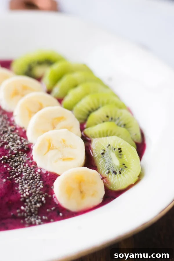 Close-up of a creamy 5-Minute Smoothie Bowl garnished with fresh toppings