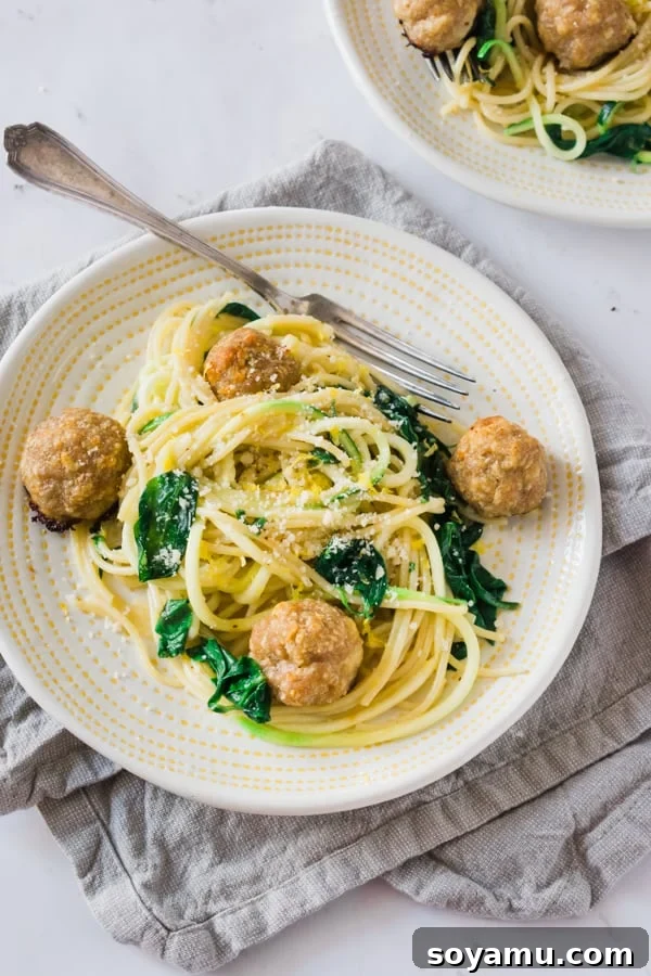 Meal Prep Meatballs with Zoodles - A quick and easy way to meal prep! Baked turkey parmesan meatballs, zoodles mixed with pasta in a garlicky-butter sauce with fresh spinach and herbs - YUM! Freeze half of the meatballs for later. #mealprep #healthydinner #dinnerrecipes #zoodles #turkey #meatballs #easyrecipes #healthyrecipes #bluebowlrecipes | bluebowlrecipes.com Meal Prep Meatballs with Zoodles - A quick and easy way to meal prep! Baked turkey parmesan meatballs, zoodles mixed with pasta in a garlicky-butter sauce with fresh spinach and herbs - YUM! Freeze half of the meatballs for later. #mealprep #healthydinner #dinnerrecipes #zoodles #turkey #meatballs #easyrecipes #healthyrecipes #bluebowlrecipes | bluebowlrecipes.com
