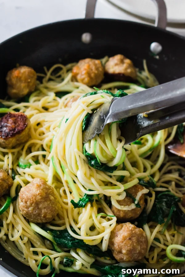 Meal Prep Meatballs with Zoodles - A quick and easy way to meal prep! Eat half the meatballs now, freeze half for later! Serve with a mix of zoodles and pasta in a yummy garlic butter sauce. #mealprep #healthyrecipe #zoodles #meatballs #dinnerrecipe #healthyeating | bluebowlrecipes.com Meal Prep Meatballs with Zoodles