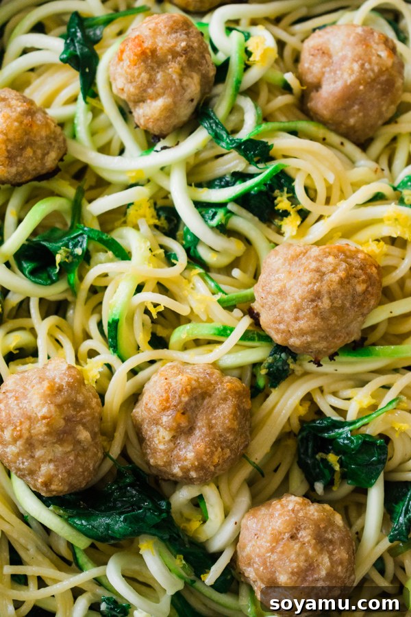 Meal Prep Meatballs with Zoodles - A quick and easy way to meal prep! Eat half the meatballs now, freeze half for later! Serve with a mix of zoodles and pasta in a yummy garlic butter sauce. #mealprep #healthyrecipe #zoodles #meatballs #dinnerrecipe #healthyeating | bluebowlrecipes.com Meal Prep Meatballs with Zoodles