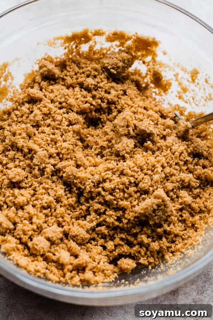No-Bake Mini Cheesecake Jars 4 A bowl of graham cracker crust mixture.