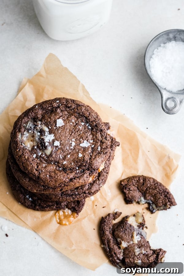 A plate of freshly baked caramel-stuffed chocolate cookies, perfect for a cozy treat. Delicious Caramel-Stuffed Chocolate Cookies served on a plate, ready to be enjoyed.