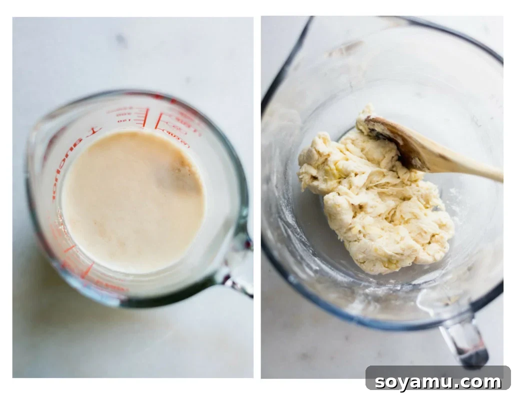 Pizza dough ingredients combined in a measuring cup, showing activated foamy yeast.