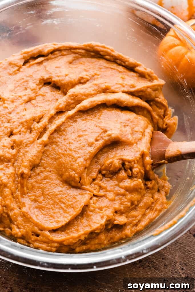 Brown Butter Pumpkin Whoopie Delights 4 A bowl of rich, spiced pumpkin whoopie pie batter, ready for baking.