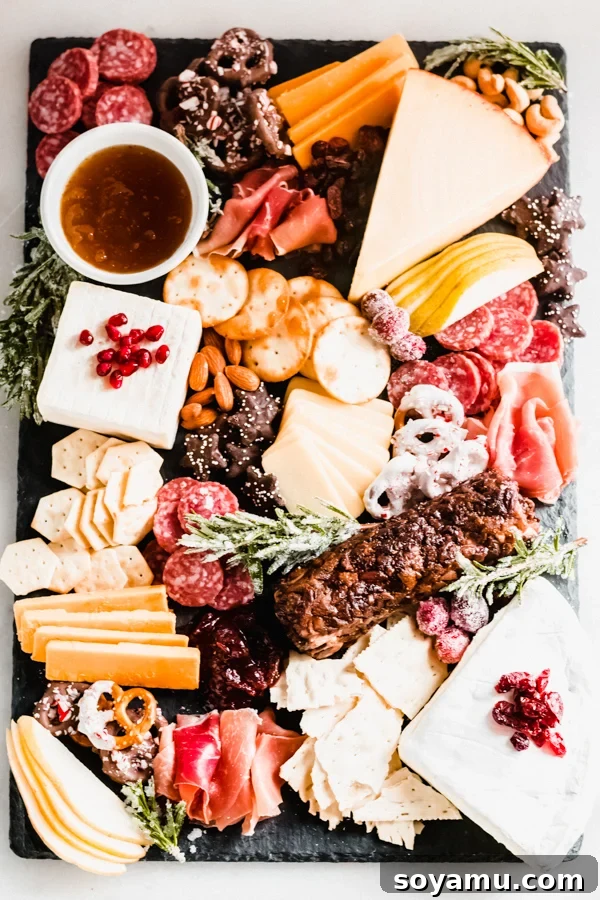 Final presentation of a gourmet cheese and charcuterie board A final close-up image of the abundant and artfully arranged cheese board.