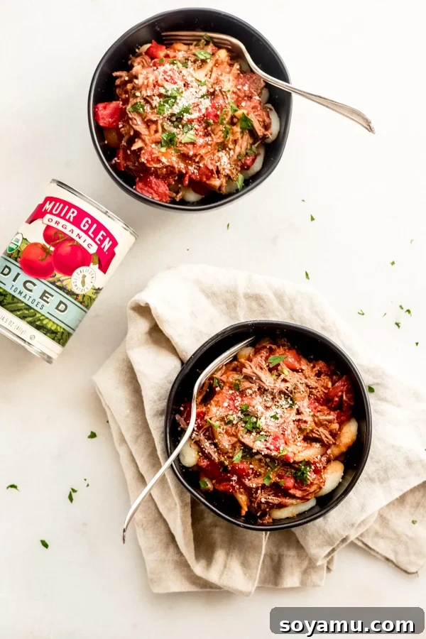Braised Beef with Tomatoes + Gnocchi - A delightful one-pot healthy comfort food recipe. A second view of the delectable braised beef dish, showcasing the rich tomato sauce and gnocchi.