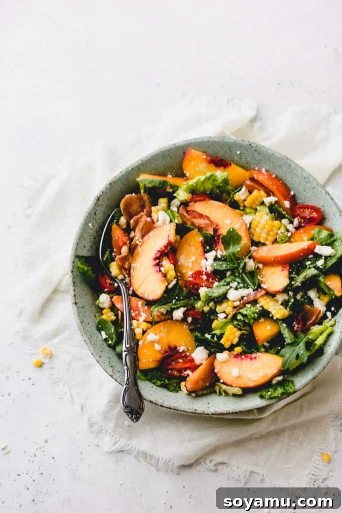 Peach Nectarine Salad with Bacon, Corn, Feta, and Creamy Avocado Dressing - Best summer meal. A vibrant Peach Nectarine Salad with Bacon, Corn, Feta, and Creamy Avocado Dressing, bursting with summer flavors.