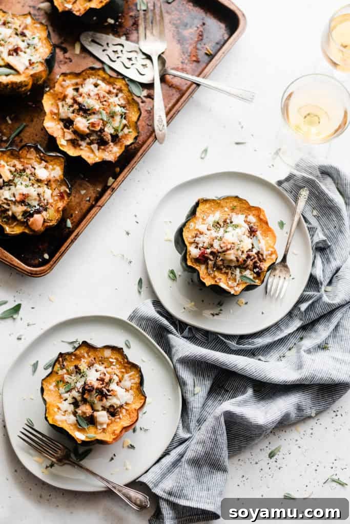 Best Ever Stuffed Acorn Squash - Wholesome and flavorful fall dinner. Beautifully roasted Stuffed Acorn Squash, filled with wild rice, apples, celery, sausage, and cranberries.