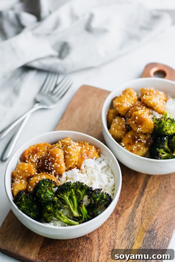 Honey Garlic Chicken Bowls - Gluten-free and dairy-free friendly meal. Honey Garlic Chicken Bowls with crispy baked chicken, roasted broccoli, and rice, served in a clean-eating style.