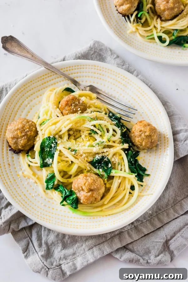 Meal Prep Meatballs with Zoodles - Healthy and versatile meal prep solution. Meal Prep Meatballs with Zoodles, showcasing turkey meatballs nestled with zucchini noodles and a light sauce.