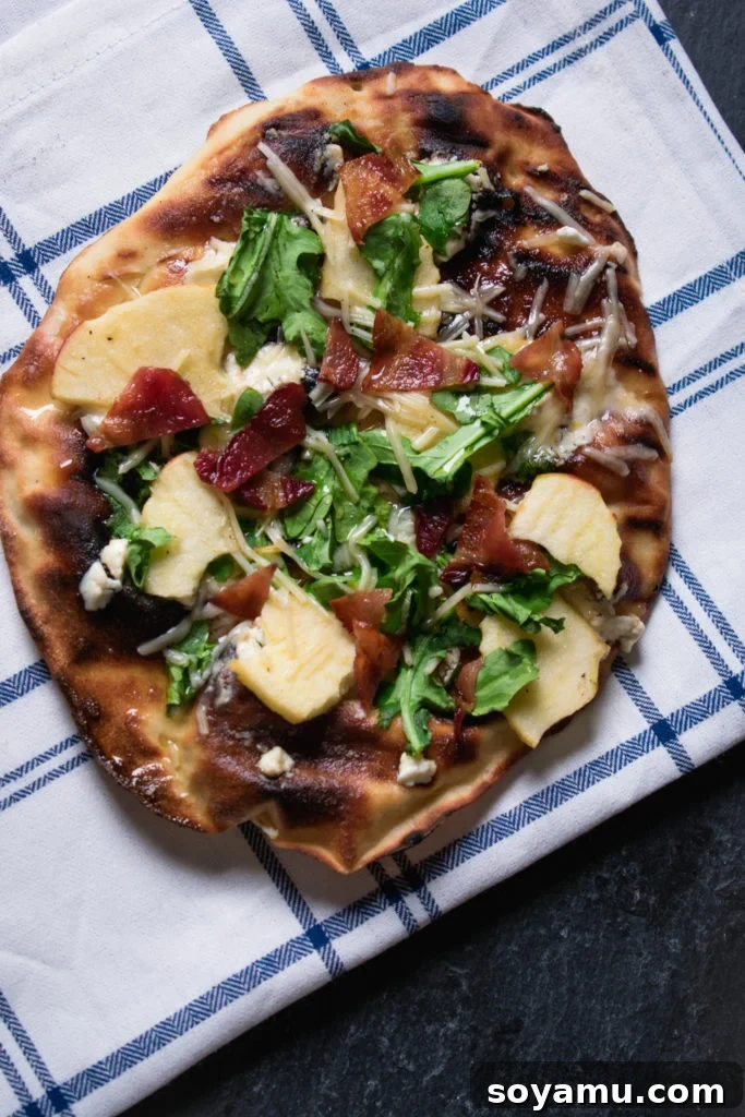 Grilled Flatbread Pizzas Delicious grilled flatbread pizzas topped with fresh ingredients, showing a crispy crust.