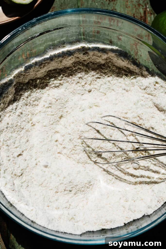 A bowl of the dry ingredients whisked together.
