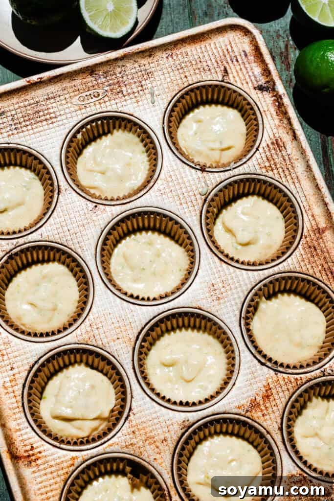 An overhead photo of the cupcake batter in the pan, ready for the oven.