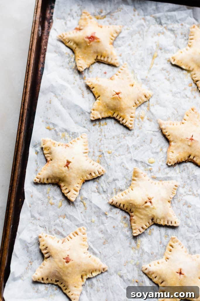 Strawberry Rhubarb Hand Pies Hand pies on tray ready to be baked