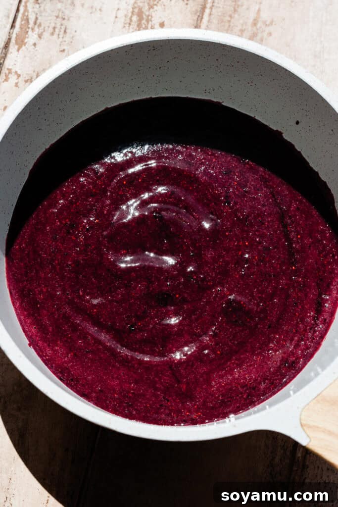 Double Blueberry Bundt Cake Recipe for Moist, Fruity Treat 5 The blueberry liquid in a saucepan.