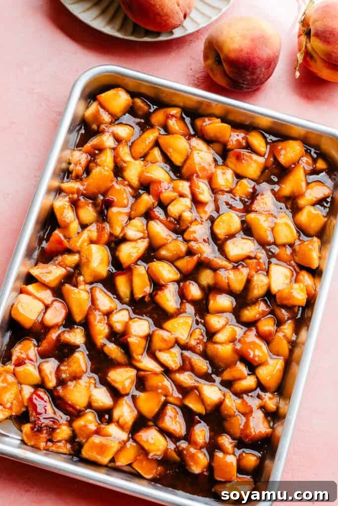 Southern-Style Peach Cobbler Muffins Recipe 5 A pan of the peach cobbler topping cooling.