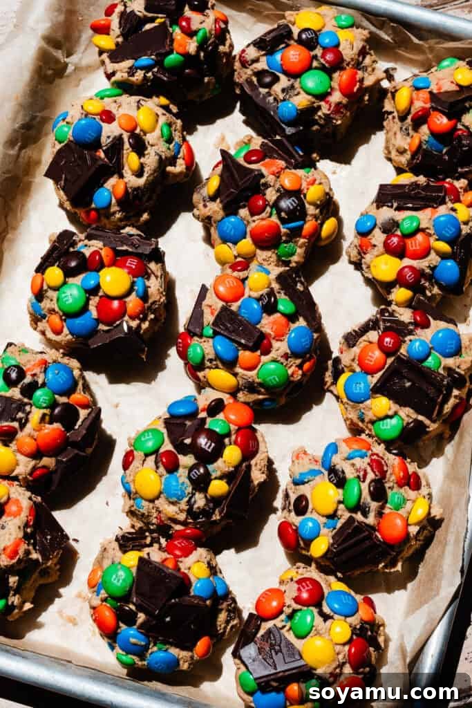 Thin, Chewy M&M Chocolate Chip Cookies 9 The cookie dough balls on a pan.