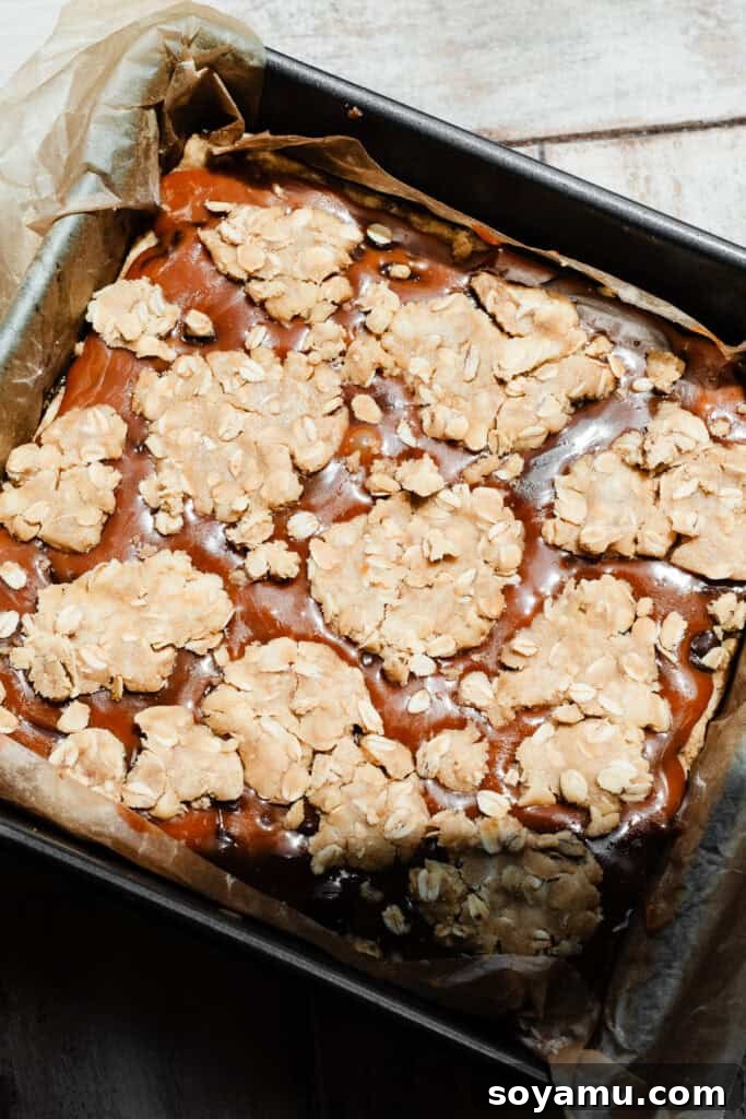 Carmelita Bars with Homemade Salted Caramel Filling 10 The assembled bars, ready to be baked.