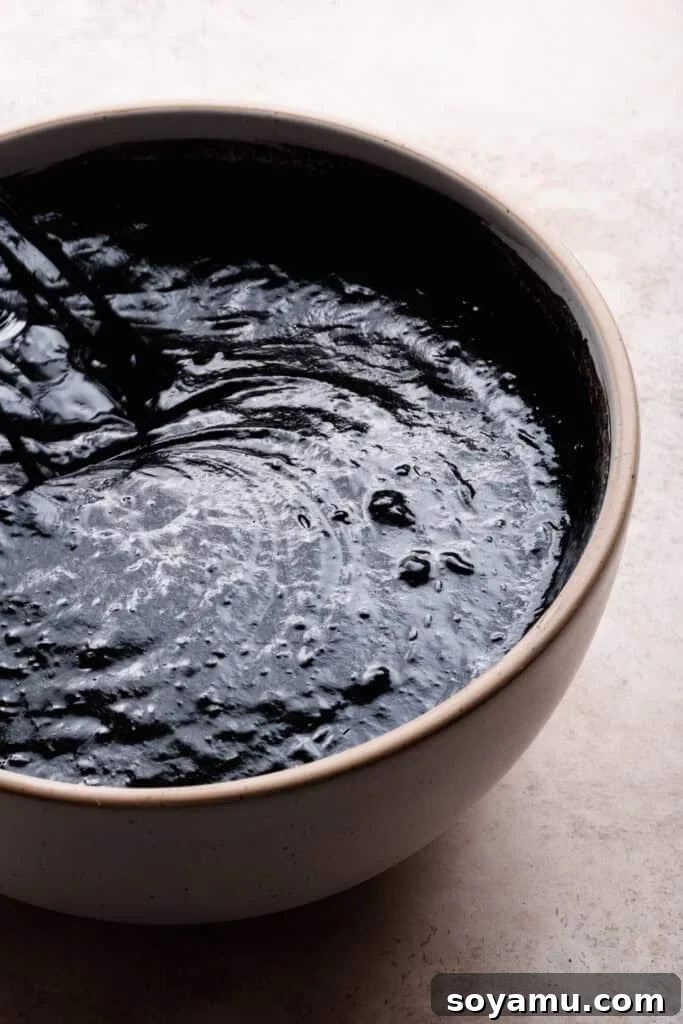 Decadent Moist Oreo Cake Recipe 8 A bowl of the semi-thick cake batter.