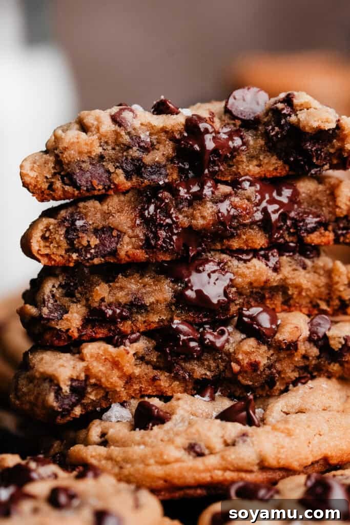 Chewy No-Chill Peanut Butter Chocolate Chip Cookies 4 A close-up on a stack of gooey peanut butter chocolate chip cookie halves.