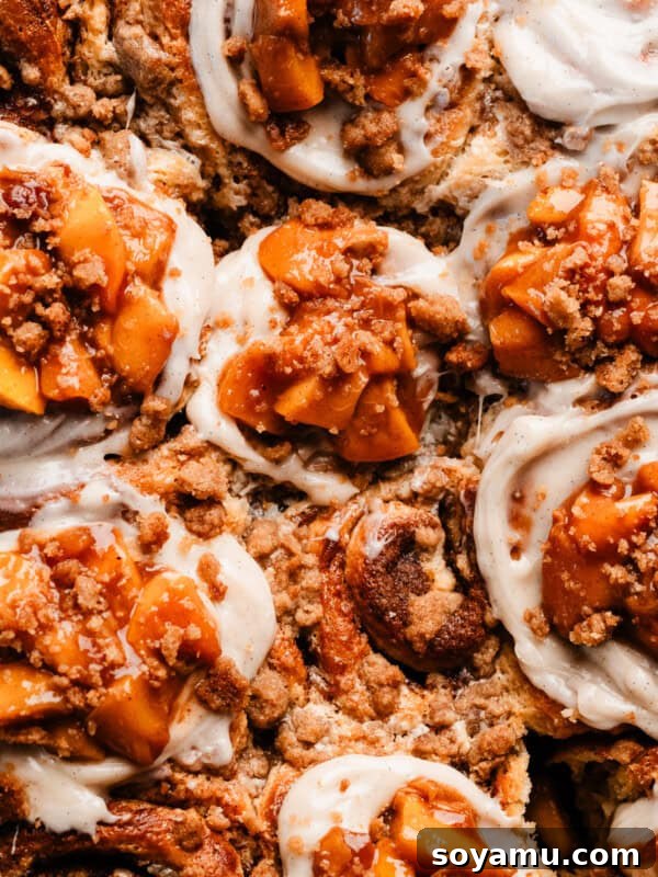 A bird's eye view of the peach cobbler cinnamon rolls.